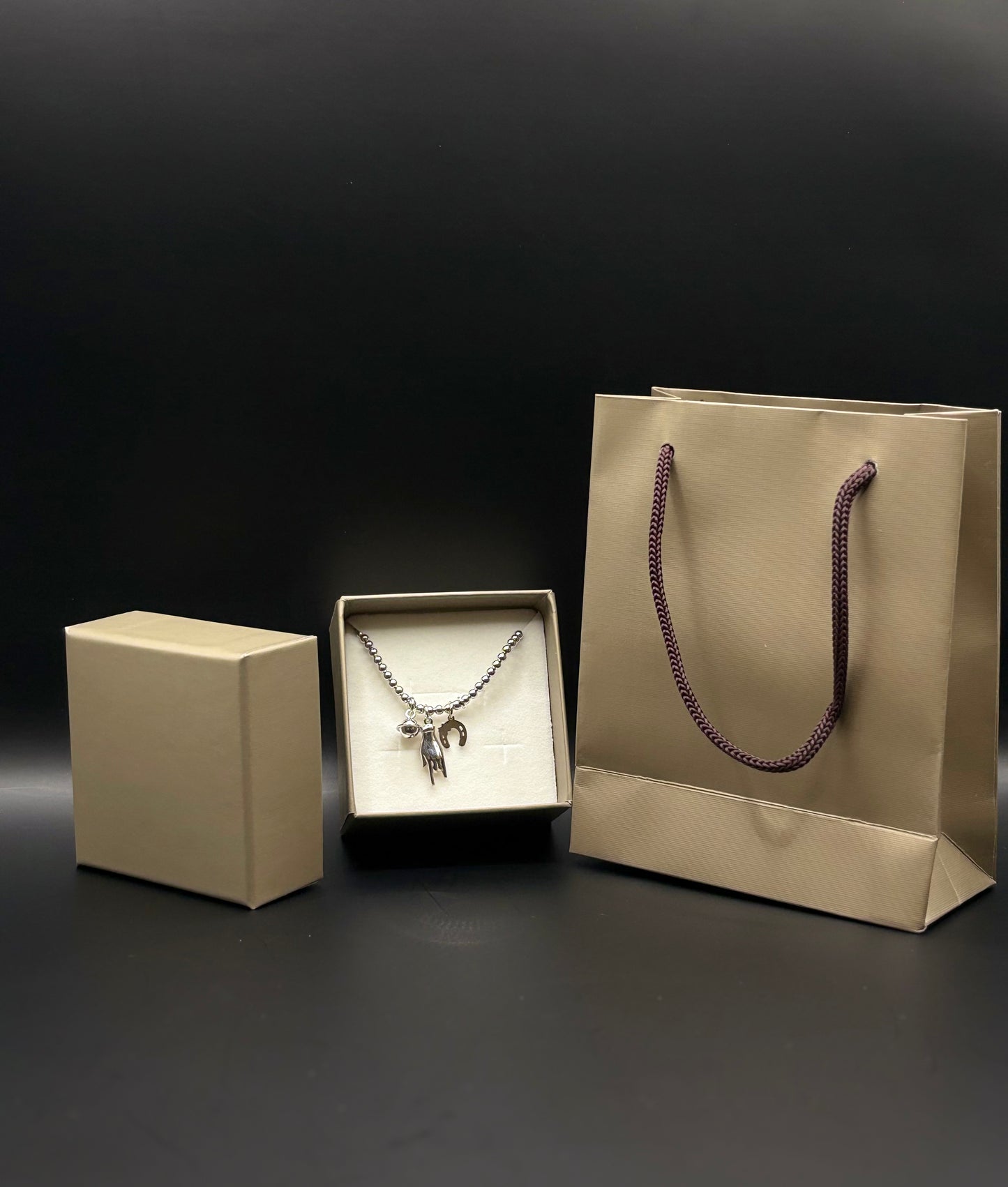 Elastic bracelet made of 925 sterling silver with symbol pendants