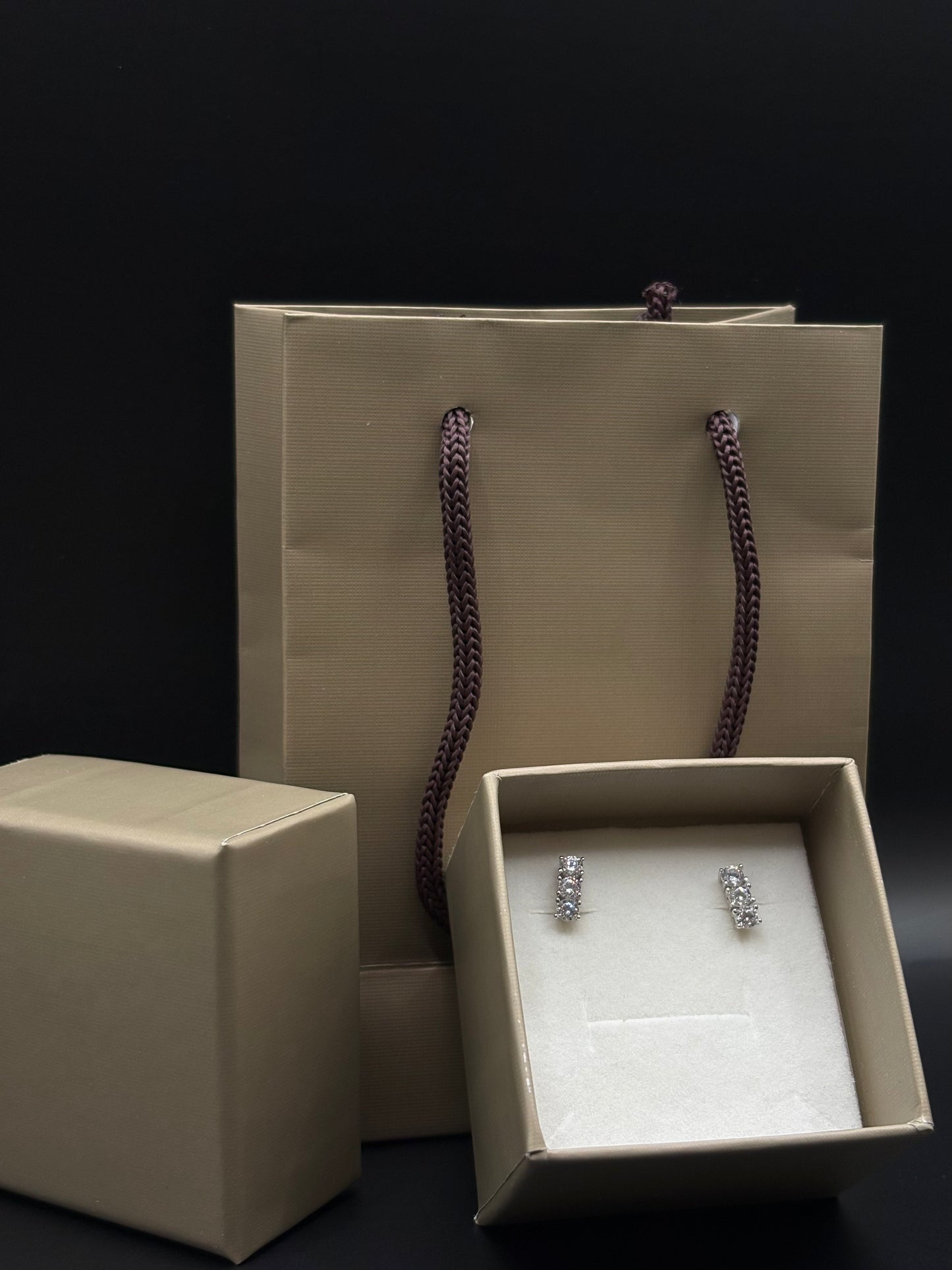 Elegant cubic zirconia stud earrings with three stones