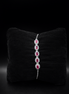 Élégant bracelet en argent avec des pierres roses ovales