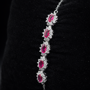 Élégant bracelet en argent avec des pierres roses ovales