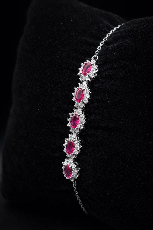 Elegantes Silberarmband mit ovalen pinken Steinen