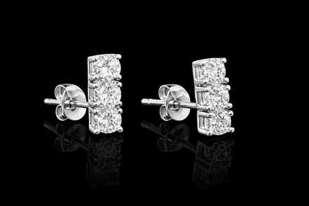 Elegante Zirkonia Steckerohrringe Drei Steine