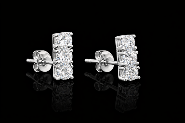 Elegante Zirkonia Steckerohrringe Drei Steine