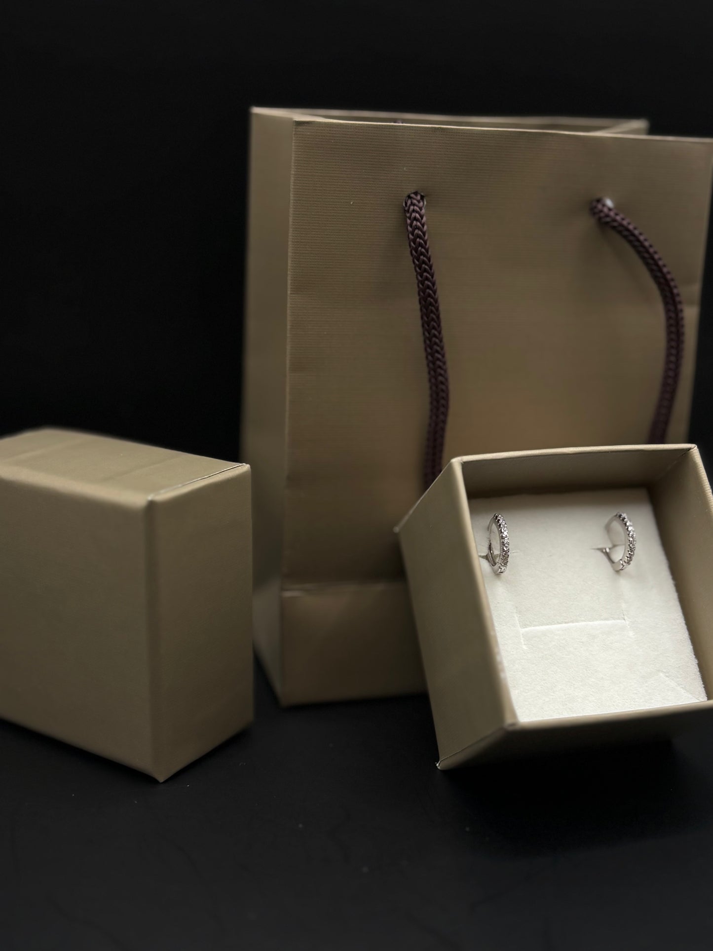 Hoop earrings made of 925 sterling silver with white zircons