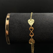 Armband aus vergoldetem 925 Sterling Silber mit Unendlichkeits-Symbol und Herzmotiven