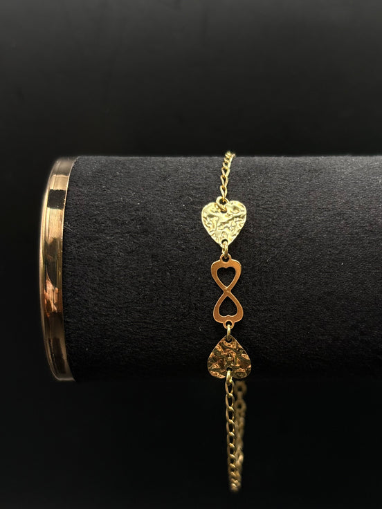 Armband aus vergoldetem 925 Sterling Silber mit Unendlichkeits-Symbol und Herzmotiven